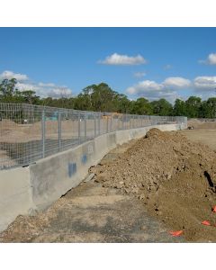 Mesh fence for concrete barrier or jersey barrier
